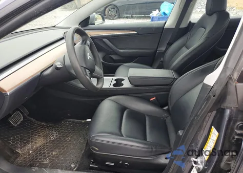 2023 Tesla Model 3 z USA, uszkodzony, nr VIN 5YJ3E1EAXPF565602